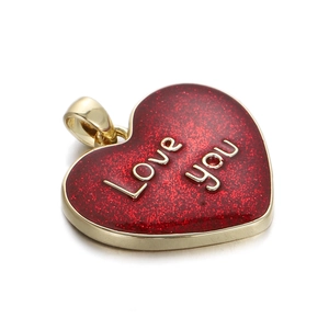 Close-up of 14K gold heart pendant with red glitter finish and Love you lettering