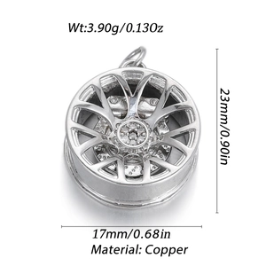 Detailed macro view of silver copper car wheel hub pendant with sparkling zircon inlay