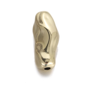 Macro shot of 14k gold-plated irregular spacer bead with polished mirror finish and hole