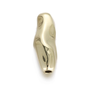 Close-up of irregular 14k gold-plated copper spacer bead with a polished organic shape
