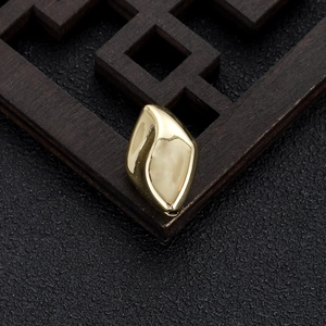 Macro view of 14k gold-plated irregular geometric spacer beads for DIY jewelry making
