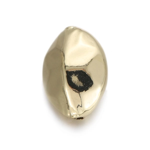 Close-up of polished 14k gold plated irregular pebble bead for DIY jewelry making
