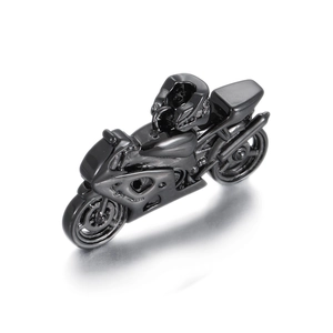 Detailed view of matte black motorcycle pendant with helmet and polished reflection