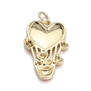 Macro detail of golden heart-shaped hot air balloon pendant with hollow craft
