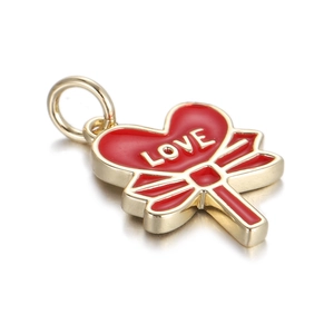 Detailed view of red heart lollipop pendant with LOVE engraving for jewelry DIY