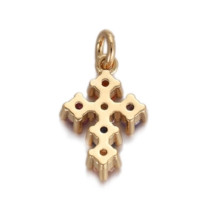 Detailed view of golden cross pendant featuring colorful gemstones and hollow back design