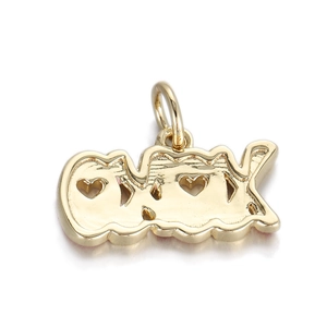 Detailed close-up of golden hollow letter heart pendant with polished wavy edges