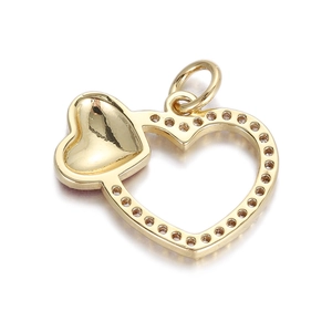 Detailed close-up of golden double-heart pendant with textured hollow outer frame