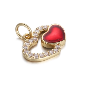 Detail of heart pendant with red enamel and sparkling cubic zirconia stones