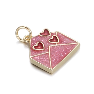 Close-up of pink glitter envelope charm with red hearts for DIY jewelry making