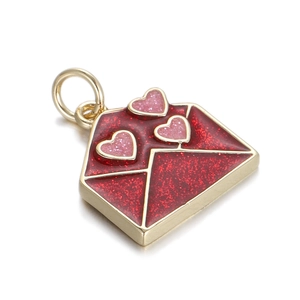 Detail view of red glitter envelope pendant with golden edges and pink hearts