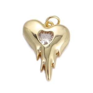 Dettaglio di un ciondolo a cuore in oro fuso con pietra di cristallo per gioielli fai da te