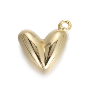 Detail shot of a polished golden puffy heart pendant with vertical embossed line and loop