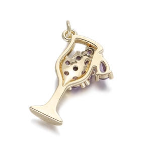 Detailed view of champagne glass pendant in gold metal with purple gems and charms