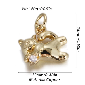 Detail view of gold cat pendant with measurements 15x12mm and white zircon inlay