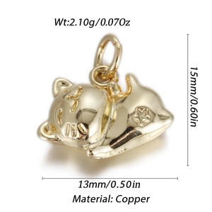 Detail of golden cat-shaped copper pendant with star engraving and dimensions