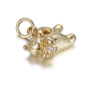 Polished gold teddy bear charm holding a sparkling round zircon stone for DIY jewelry