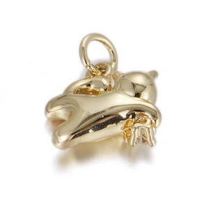 Macro view of a gold-plated bear pendant featuring high-polish finish and clear zircon inlay
