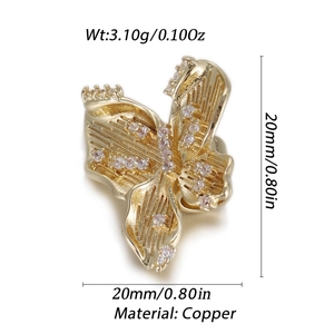 Detailed view of a gold-plated copper butterfly charm with cubic zirconia pavé setting