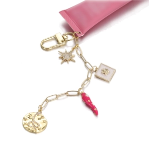 Llavero dorado con colgantes de esmalte, sol, rosa y serpiente para bolsos de mujer