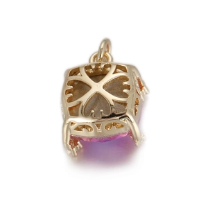 Detailed back view of golden heart pendant with hollow filigree and purple zircon stone