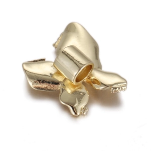 Macro shot of gold-plated butterfly pendant with polished finish and cubic zirconia inlay