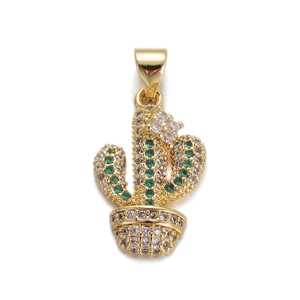 Macro detail of a gold cactus pendant with green and white cubic zirconia micro-inlay