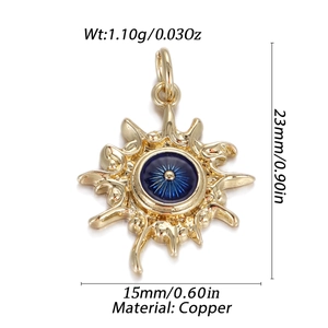 Macro detail of sunburst evil eye pendant in gold copper with blue enamel inlay