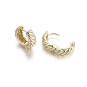 Classic golden twisted hoop earrings with a textured croissant spiral design