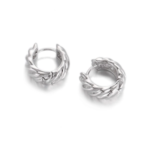 Detailed view of silver hoop earrings featuring a minimalist twisted rope design and high polish