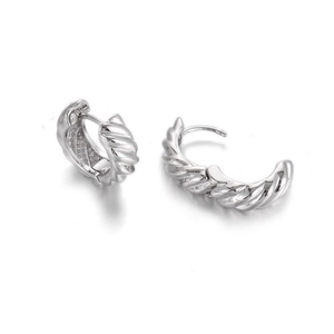 Detailed view of silver twisted rope hoop earrings with textured metal finish and clasp