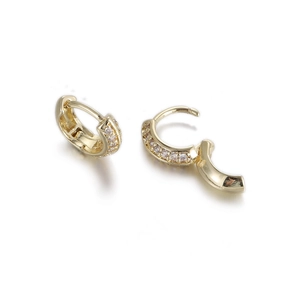 Close-up of gold huggie hoop earrings with white zircon inlays and S925 silver stamp
