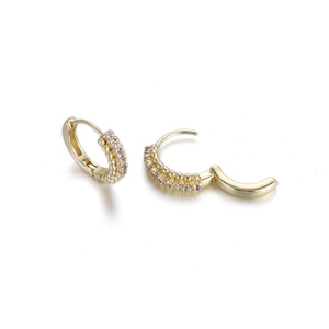 Detail of 18K gold huggie earrings with double-row zircon pavé and closure mechanism