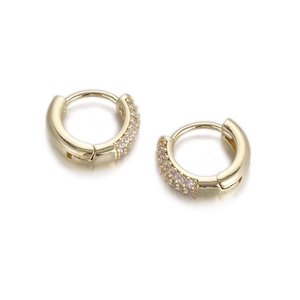 Close-up of gold pavé hoop earrings with micro-set sparkling zircon crystals