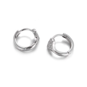 Detail of silver hoop earrings with micro-pave cubic zirconia and snap closure mechanism