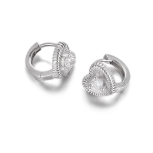 Detailed view of silver heart hoop earrings with radiant textures and zircon inlay