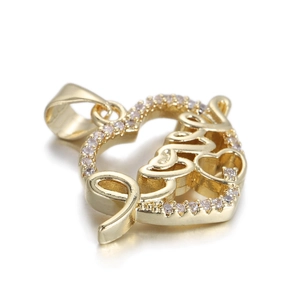 Macro detail of 14k gold plated heart pendant with Love script and zircon inlay