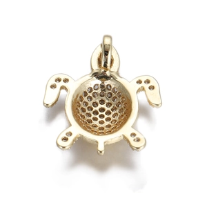 Macro view of 14k gold sea turtle pendant with micro-inlaid crystals and honeycomb shell