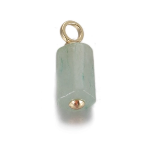 Macro shot of light green natural stone pendant with gold metal caps and bail