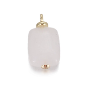 Macro shot of rectangular pale pink natural quartz stone pendant with gold metal caps