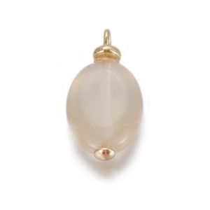 Detailed view of an oval agate stone pendant with gold metal clasp and polished surface