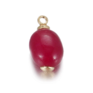 Detail of red agate oval stone pendant with golden metal caps and bail for jewelry
