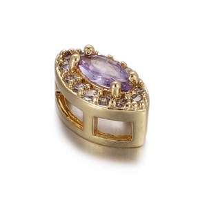 Macro view of a 14k gold-plated floral coin pendant with purple marquise-cut zircon stones
