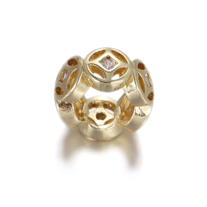 Detail of 14k gold-plated coin charm with micro-set zircon stones for jewelry making