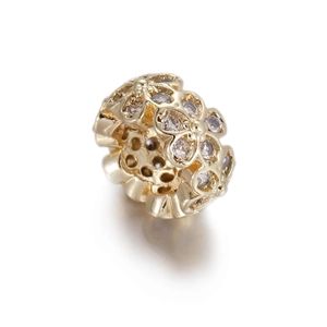 Macro view of 14k gold plated flower spacer bead with cubic zirconia for DIY jewelry