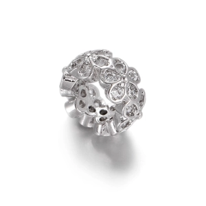 Macro detail of 14k gold-filled flower charm with micro-pave cubic zirconia stones