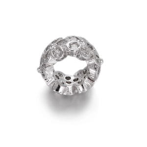 Macro shot of silver floral spacer bead with micro-set cubic zirconia and hollow design