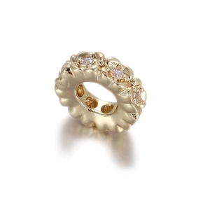 14k gold-filled flower coin spacer bead with pink zircon inlays and wavy edge design
