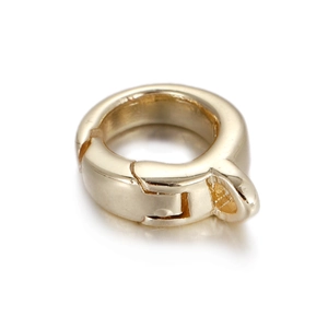 Macro detail of a 14k gold-filled flower toggle clasp for DIY jewelry making and necklaces