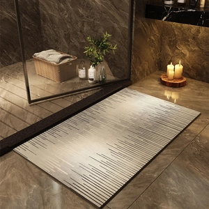 Detail of absorbent diatomite bath mat with grey striped pattern in a modern bathroom